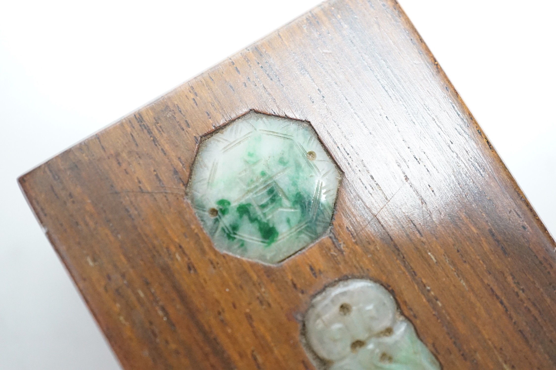 A Chinese jadeite mounted hongmu wood paperweight, 7.5 x 5 x 2.5cm